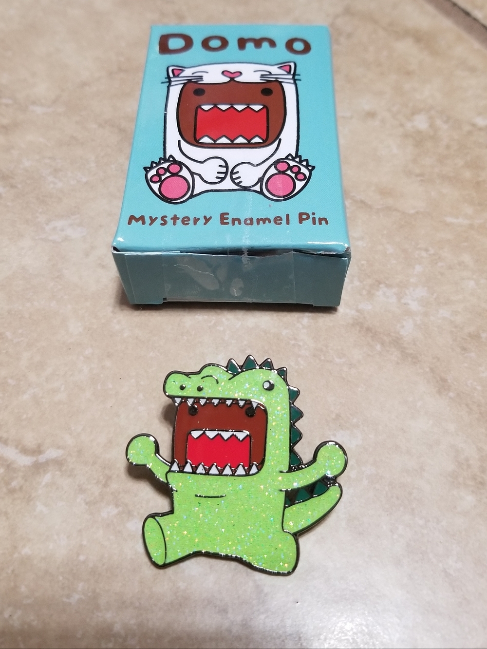 Domo In Costumes Mystery Enamel Pin: Chase Dinosaur Domo
